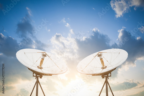 satellite dish antennas under sky