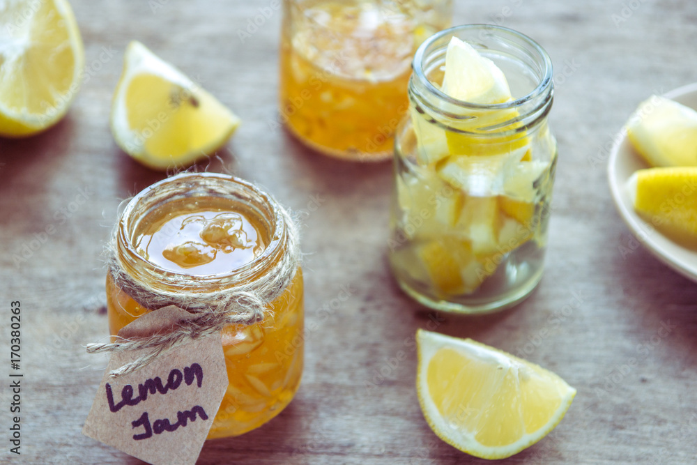 Homemade lemon jam in glass jar. Organic fresh yellow jam Homemade lemon jam in glass jar. Organic fresh yellow jam