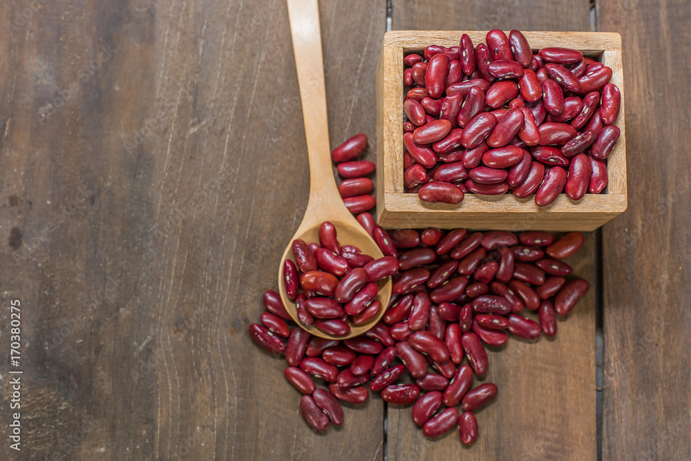 Red beans on the wood background