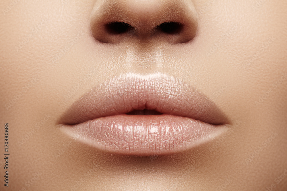 © marinafrost - Closeup plump Lips. Lip Care, Augmentation, Fillers. Macro photo with Face detail. Natural shape with perfect contour