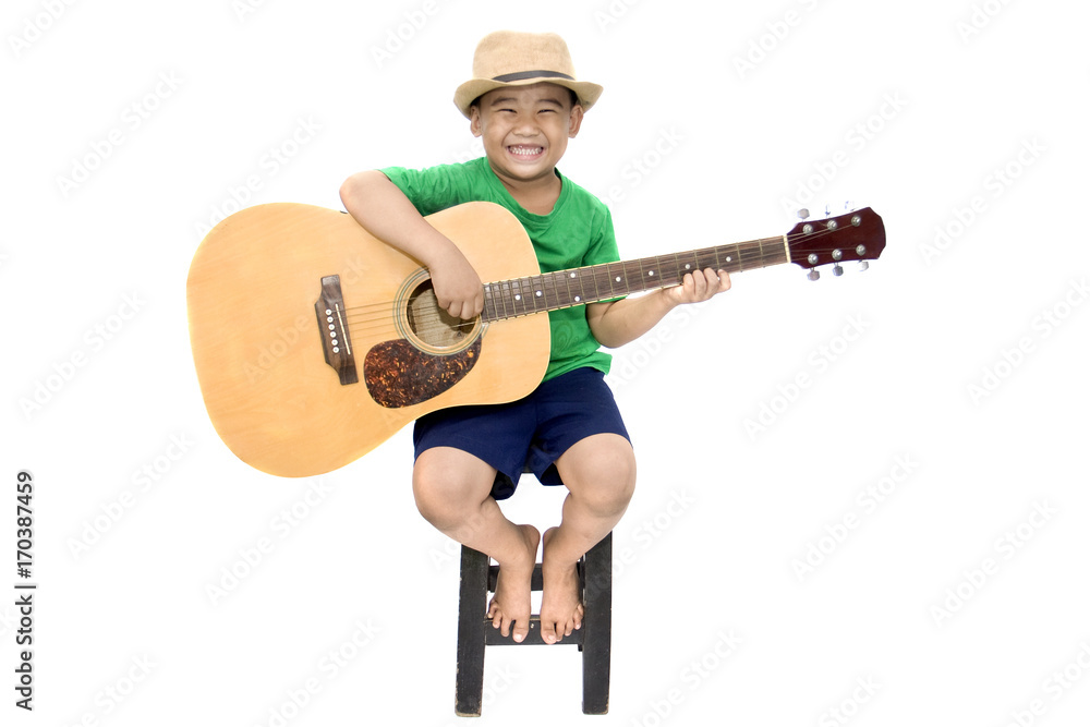 asian boy playing guitar on isolated white background asian boy playing guitar on isolated white background