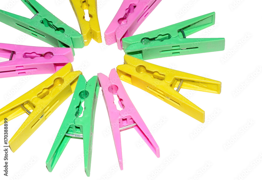 Clothes peg and sheet of blue paper, background Clothes peg and sheet of blue paper, background
