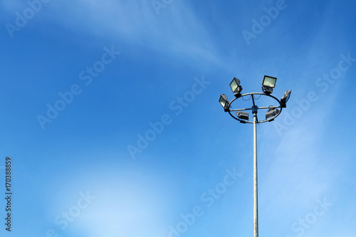 circle streetlight electric blue sky background