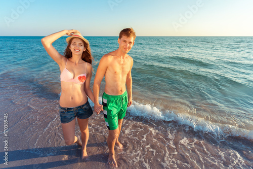 Couple taking a walk on the beach © fotofabrika