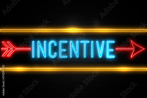 Incentive  - fluorescent Neon Sign on brickwall Front view photo