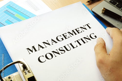 Folder and papers with title Management consulting.