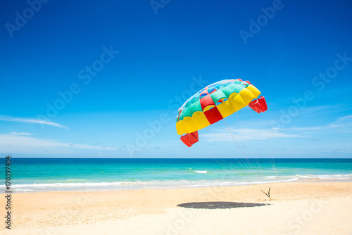 Colorful parasail wing pulled by the sea ,Phuket,Thailand.