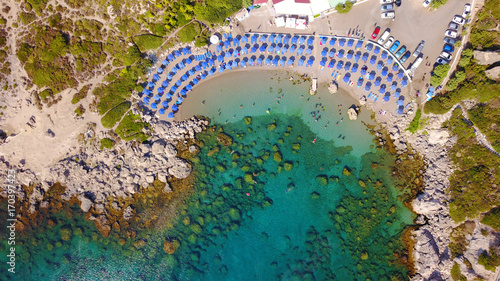 August 2017: Aerial drone photo of famous beach of Ladiko near iconic Anthony Quinn Bay, Rodos island, Aegean, Dodecanese, Greece photo