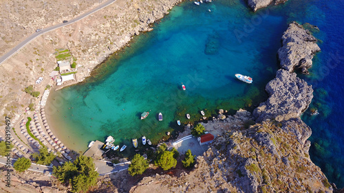 Fototapeta Naklejka Na Ścianę i Meble -   Aerial drone photo of famous St.Paul's bay with turquoise waters, Lindos, Rodos island, Aegean, Dodecanese, Greece