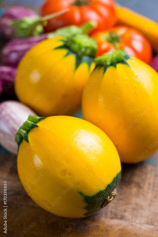 Fresh organic vegetables - round courgette, small eggplants, tomatoes, diet concept, Italian and French food, healthy food.