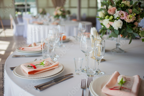 Wedding decor. Flowers in the restaurant, table setting © Ulia Koltyrina