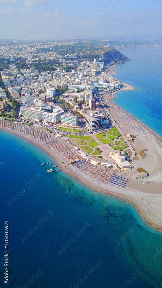 August 2017: Aerial drone photo of Rodos town peninsula with famous resorts and turquoise clear waters, Rhodes island, Aegean, Dodecanese, Greece