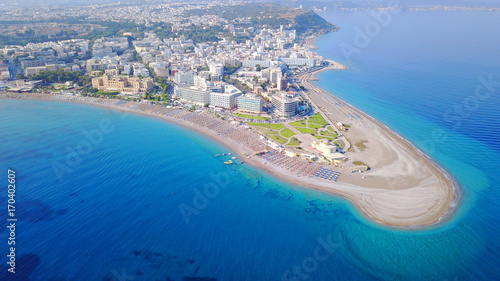 August 2017: Aerial drone photo of Rodos town peninsula with famous resorts and turquoise clear waters, Rhodes island, Aegean, Dodecanese, Greece