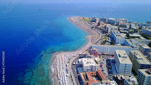 August 2017: Aerial drone photo of Rodos town peninsula with famous resorts and turquoise clear waters, Rhodes island, Aegean, Dodecanese, Greece © aerial-drone