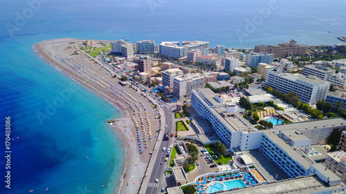 August 2017: Aerial drone photo of Rodos town peninsula with famous resorts and turquoise clear waters, Rhodes island, Aegean, Dodecanese, Greece © aerial-drone