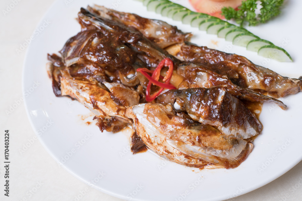 grilled mackerel(Saba) steak with teriyaki sauce and rice on white dish, popular japanese cuisine grilled mackerel(Saba) steak with teriyaki sauce and rice on white dish, popular japanese cuisine