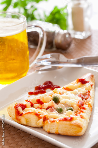 Pizza with beer