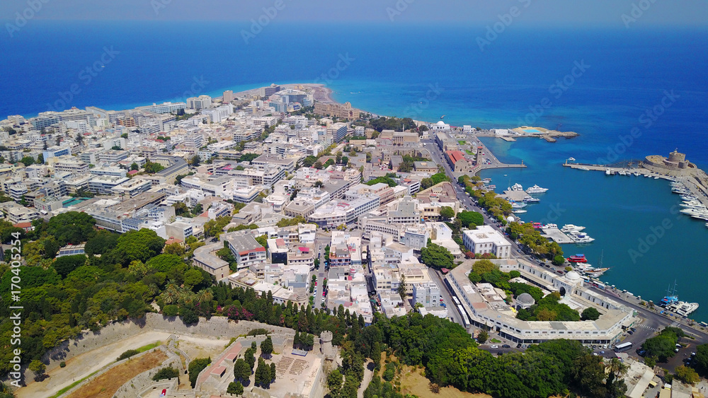 August 2017: Aerial drone photo of main port near iconic medieval fortified old town of Rodos island, Aegean, Dodecanese, Greece