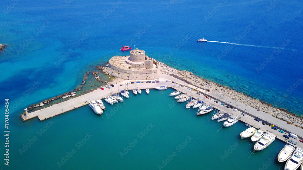August 2017: Aerial drone photo of iconic medieval fortress of St. Nicholas in port entrance of Rodos island, Aegean, Dodecanese, Greece