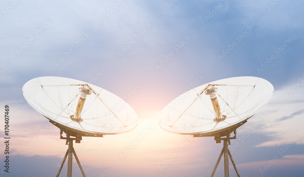 satellite dish antennas under sky