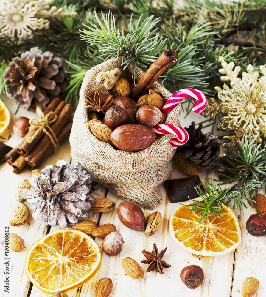New Year or Christmas composition with walnuts, mulled wine, hazelnuts New Year or Christmas composition with walnuts, mulled wine, hazelnuts