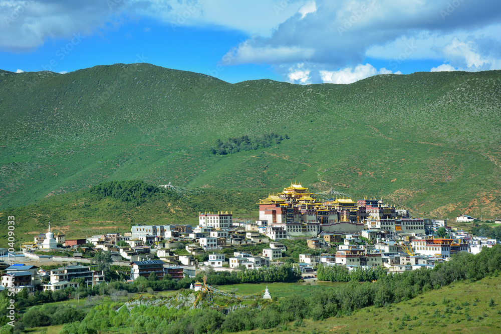 Fototapeta premium View of the Ganden Sumtseling Temple from the top of the hill. Zhongdian, Yunnan province, China.
