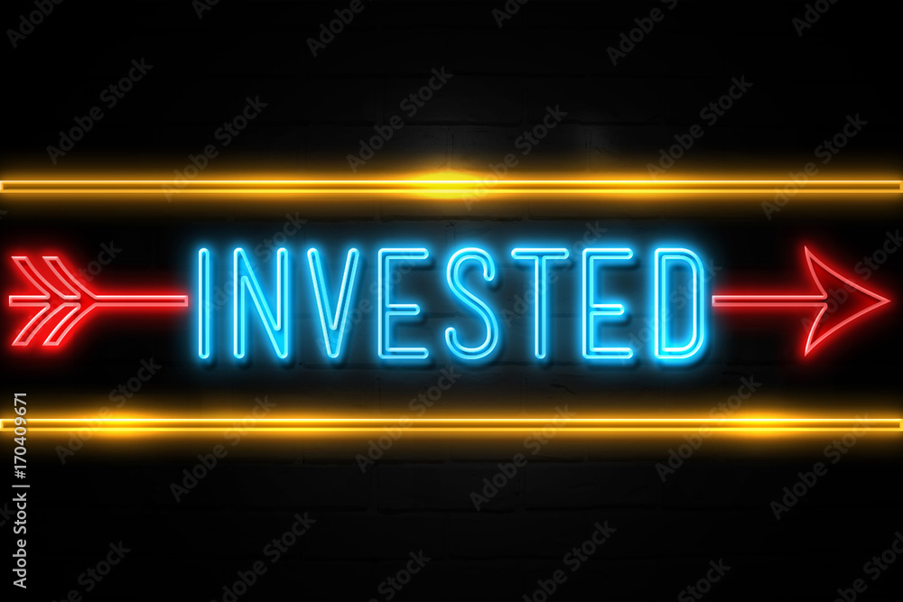 Invested - fluorescent Neon Sign on brickwall Front view Invested - fluorescent Neon Sign on brickwall Front view