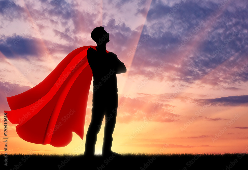Superhero businessman at sunset Superhero businessman at sunset