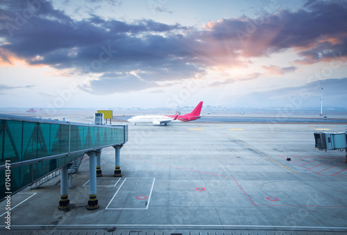 Jet aircraft docked in Dubai International Airport photo