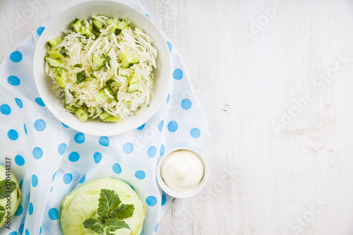 Salad with kohlrabi, cucumber and dill.