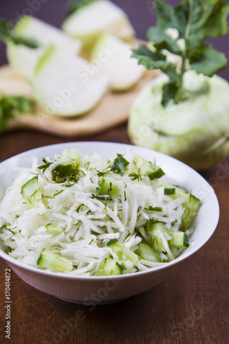 Salad with kohlrabi, cucumber and dill.