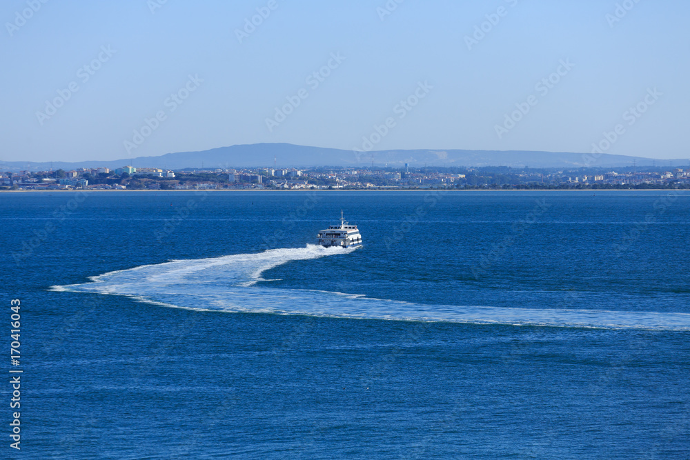 Naklejka premium Ferry Cruising Away in Lisbon
