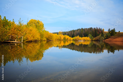 Fall country landscape with the lake