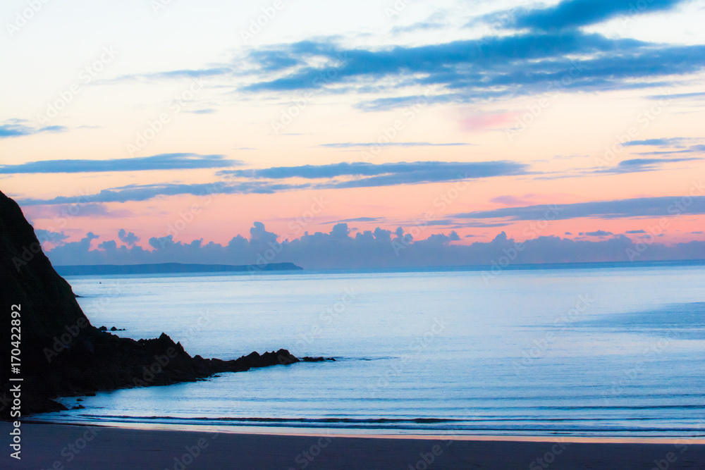 Obraz premium Empty UK beach in the evening sunset