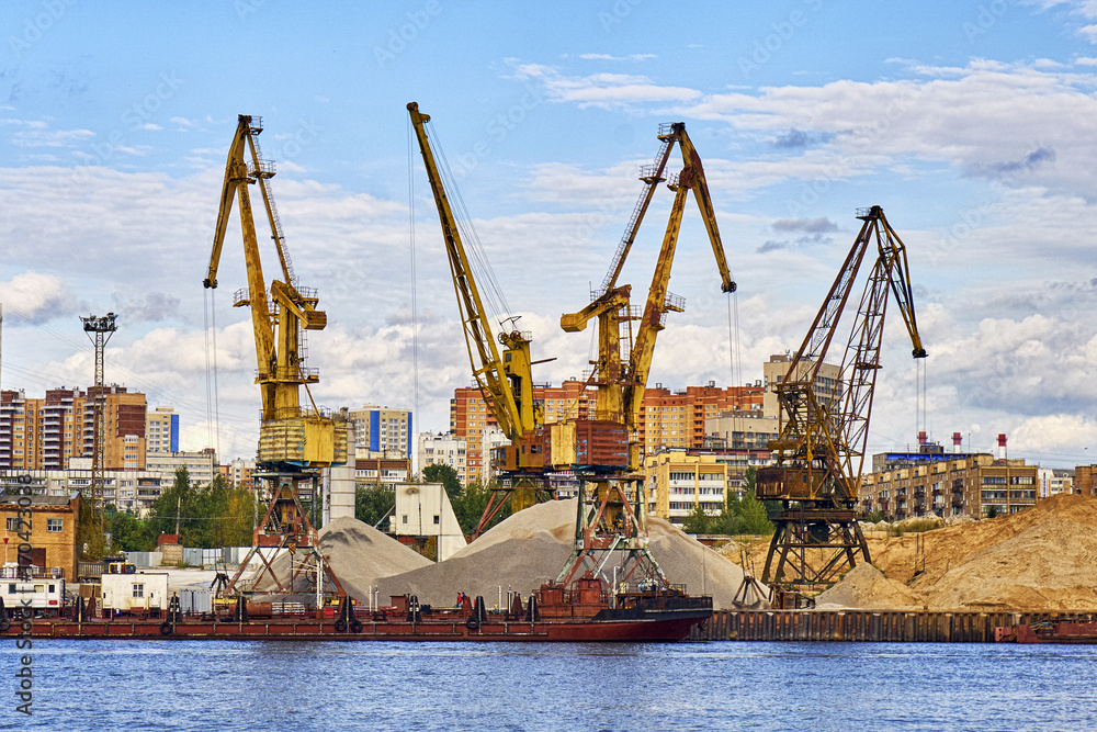 Big cargo cranes in river port in Moscow