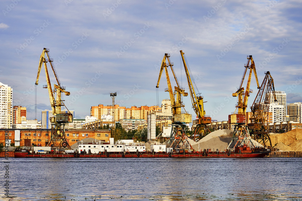 Cargo cranes in river port in Moscow