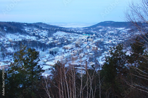 Panorama of the Ukrainian city of Kremenets from the height of the ancient fortress in winter