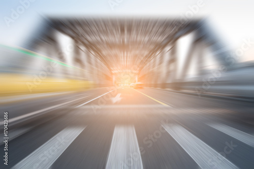 traffic through bridge with blur trail