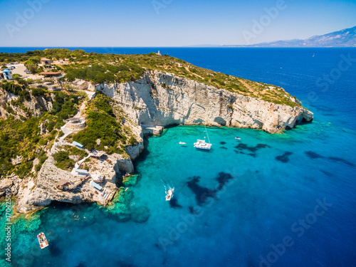 Fototapeta Naklejka Na Ścianę i Meble -  Aerial  view of  Agios Nikolaos blue caves  in Zakynthos (Zante) island, in Greece