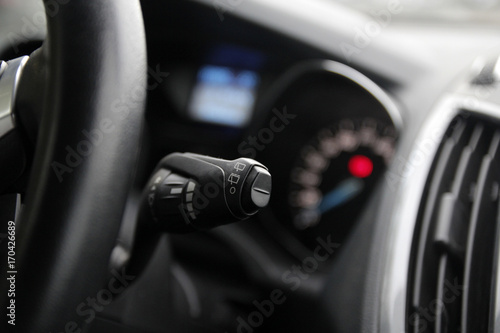 Washer lever on the steering wheel