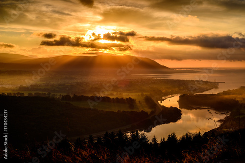 The Giant Scanner: early in the morning the Sun is already scanning the countryside looking for places to warm up after a cold night, Warrenpoint, Mourne Mountains, County Down, Northern Ireland.