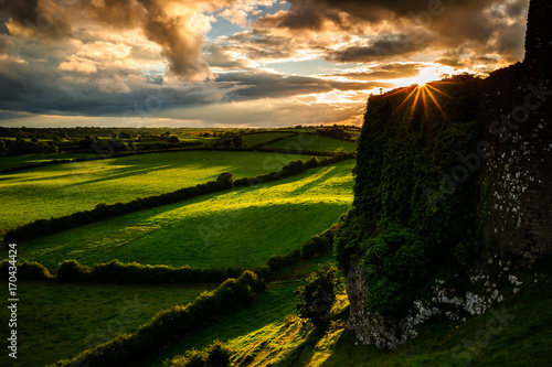 The Big Race: Wind and Sun bet tonight and launched an uncommon race between Clouds and Shadows ... who won? taken at Roche Castle, near Dundalk, County Louth, Ireland