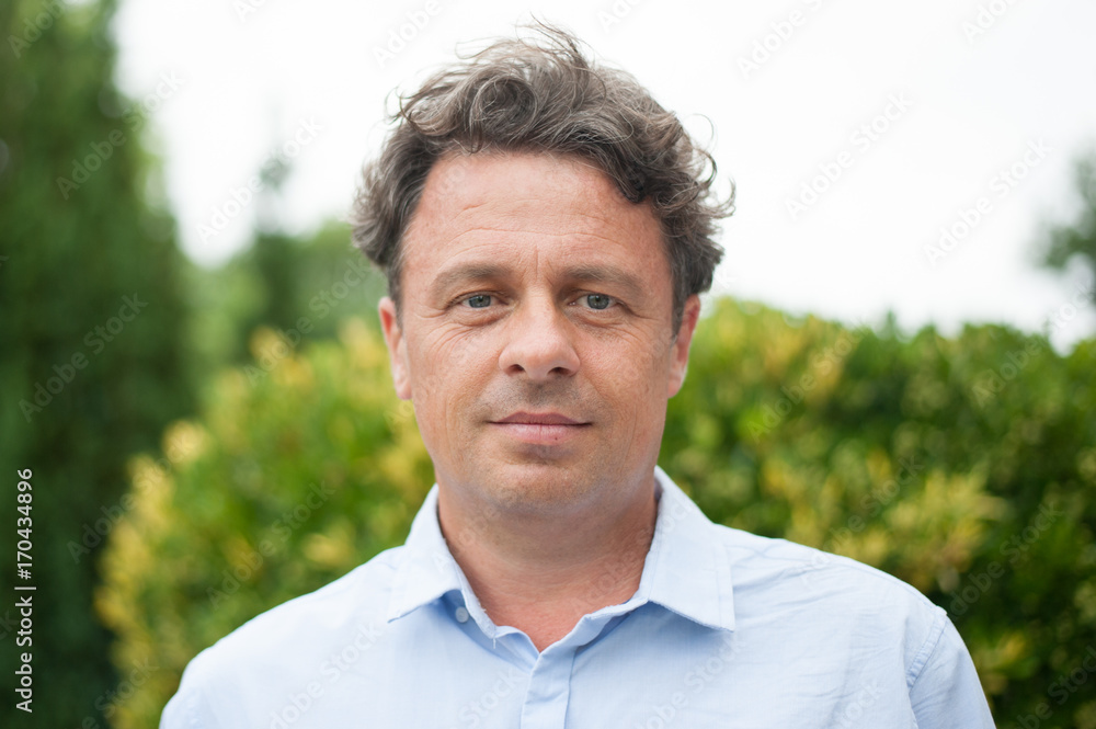 Portrait of handsome mature man outdoor summer Portrait of handsome mature man outdoor summer