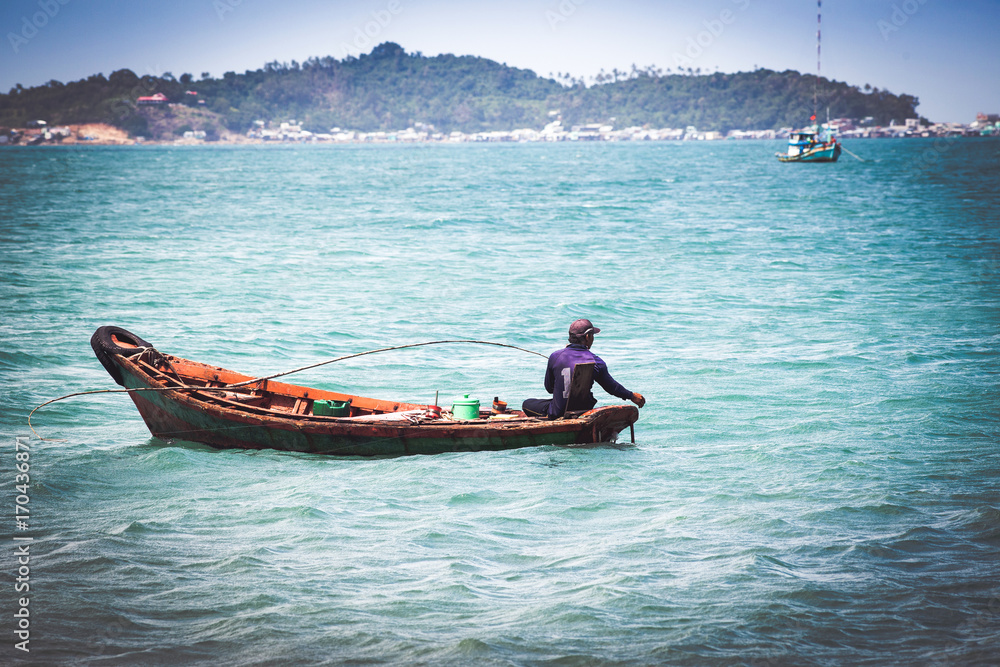 Fototapeta premium traditional colorful vietnamese fishing boats in Nam Du island, Kien Giang, Vietnam