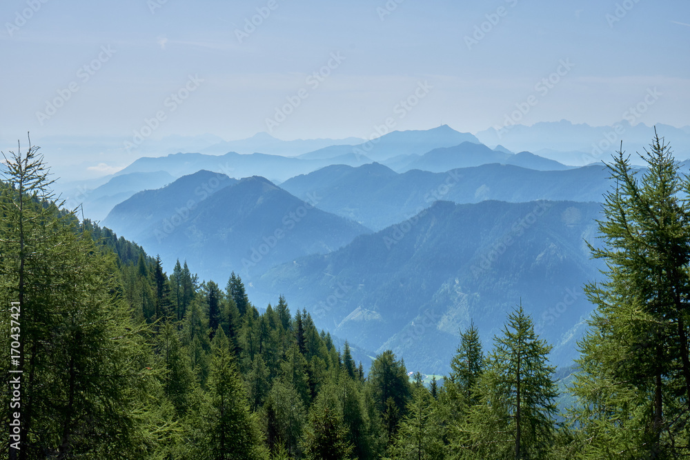 Look over misty covered mountains from the top of the Panoramastrasse on Mt. Goldeck