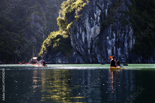kayaking among caves and lagoon in Ha Long bay, UNESCO world heritage site, Vietnam © Melinda Nagy