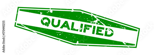 Grunge green qualified hexagon rubber seal stamp on white background