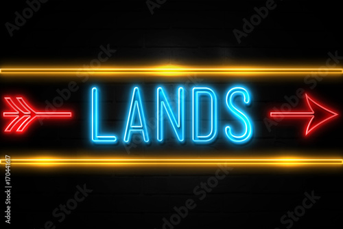 Lands - fluorescent Neon Sign on brickwall Front view