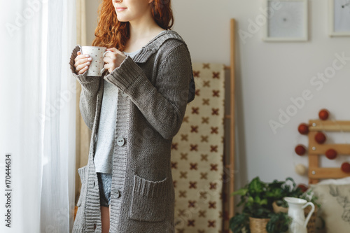 Woman in sweater photo