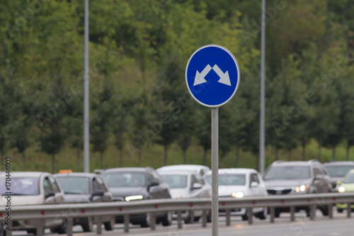 Street sign o busy road - traffic on highway